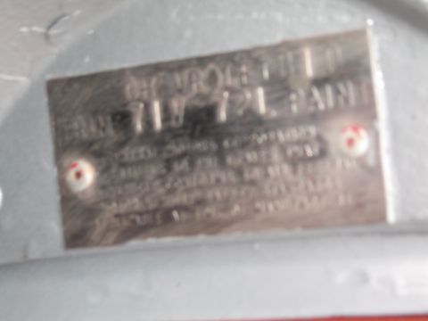1991 Ford LTD Crown Victoria - VIN plate showing Chevrolet identification and paint codes, likely from a vehicle.