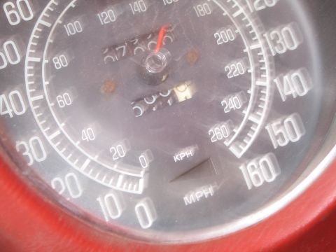 1991 Ford LTD Crown Victoria - Close-up of a car's speedometer and odometer, showing mileage and speed indicators.