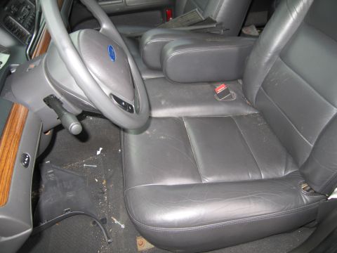 1991 Ford LTD Crown Victoria - Interior view of a 1991 Ford Crown Victoria LTD, highlighting the leather seats and steering wheel.