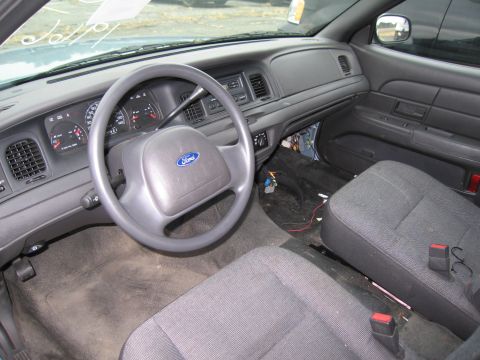 1991 Ford LTD Crown Victoria - Interior view of a 1991 Ford Crown Victoria LTD, highlighting the dashboard and seating areas.
