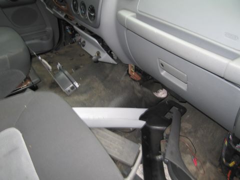1991 Ford LTD Crown Victoria - Car interior disassembled, with dashboard components removed and lying on the floor.