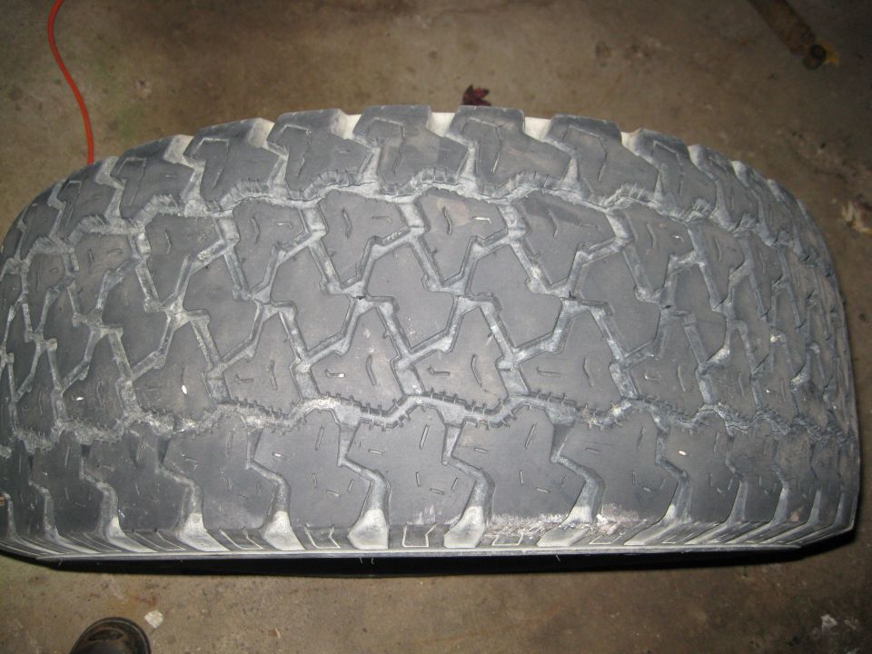 Tire with aggressive tread pattern