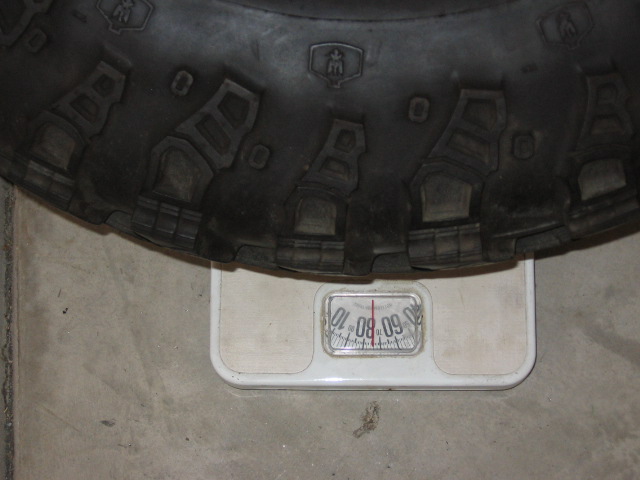 The wheel actually weighs 99lbs, and the carrier I thought would add another 20, but I guess I didn't take into account the frame mounts still holding maybe 35lbs or so of weight.