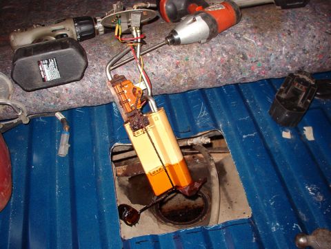 1993 Ford Bronco - There was no fuel pressure, even with the relay jumpered, so I cut an access hole & pulled the FDM. All that "rust" is actually j…