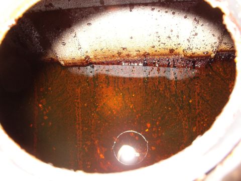 1993 Ford Bronco - The residue is all over the tank; top & bottom. I've added 2 cans of Berryman's B-12 & part of a bottle of Gumout All-in-One, but the filte…