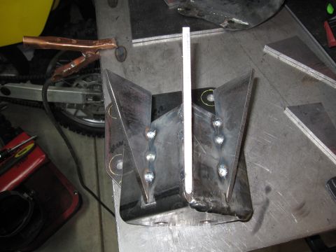 1996 Ford Bronco - A custom metal part is shown with a Supermotors.net logo at the bottom right.