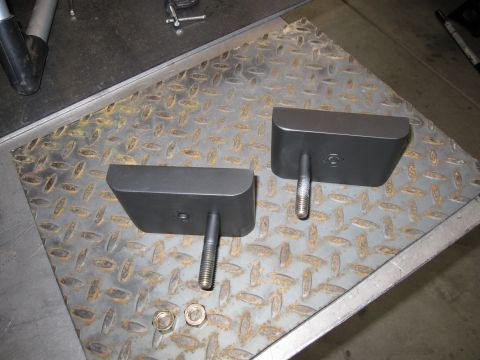 1996 Ford Bronco - These are lift blocks for vehicle suspension, shown with hardware.