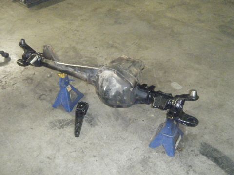 1978 Ford Bronco - Rear axle assembly on jack stands, likely for a Ford Bronco or similar vehicle.