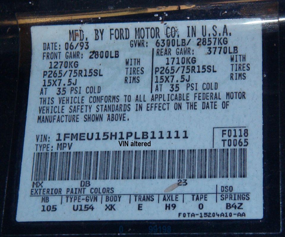 Ford door data sticker showing GVWR, tire sizes and VIN dated 06/93