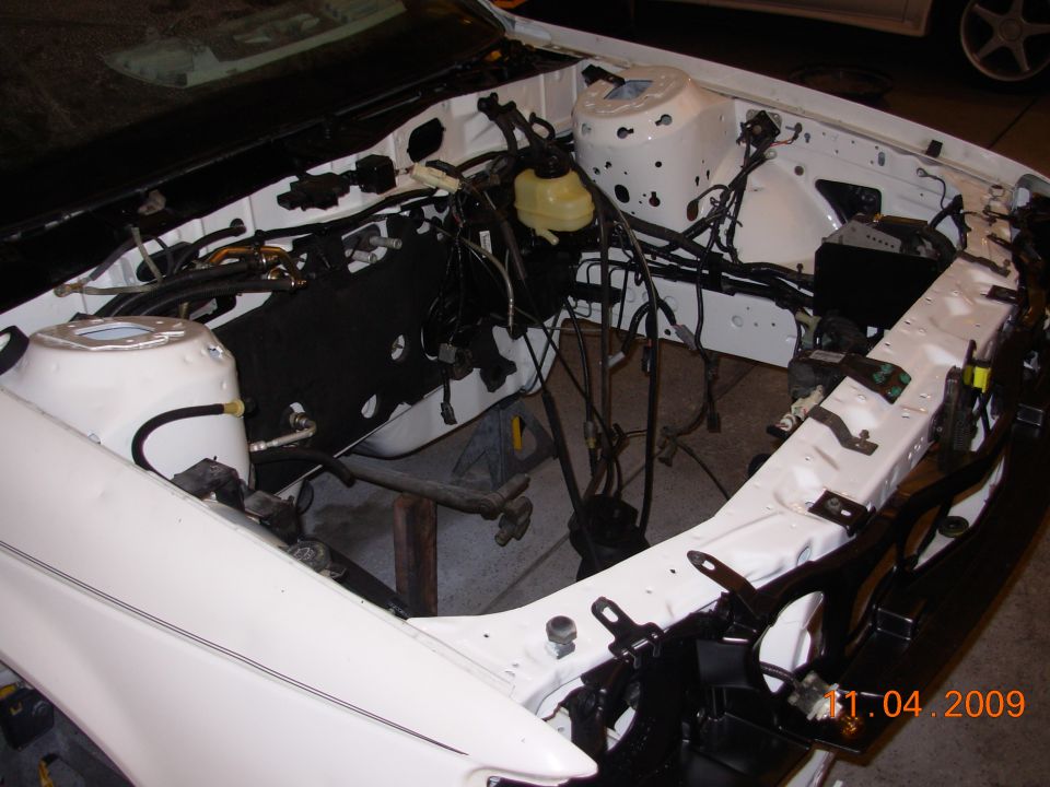 White 1991 Ford Taurus engine bay during build-up