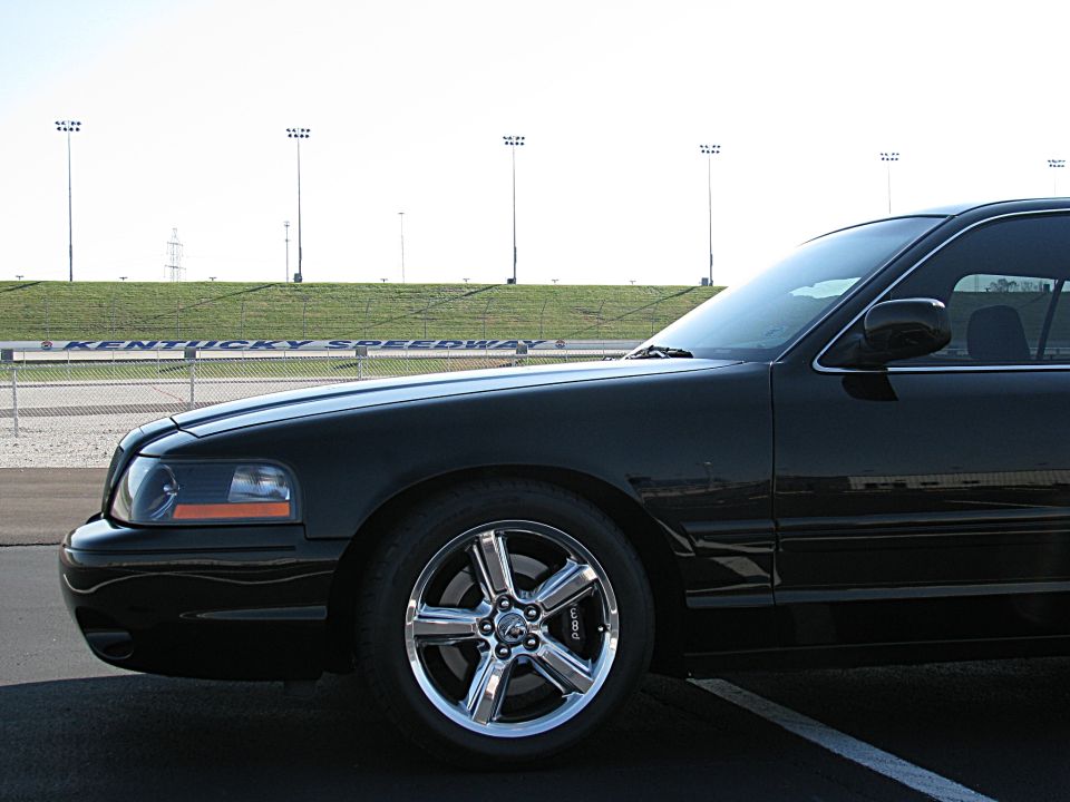 Black 2003 Mercury Marauder front quarter panel and wheel, parked at Kentucky Speedway