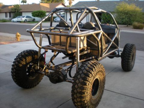 2009 Suzuki Samurai - This custom-built buggy features a robust roll cage and oversized tires for off-road use.