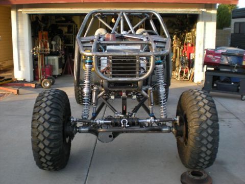 2009 Suzuki Samurai - This custom-built off-road buggy features a roll cage and heavy-duty suspension components.