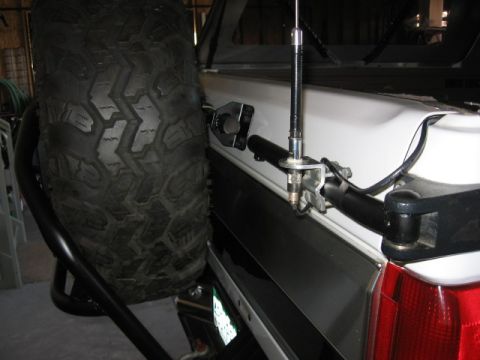 1995 Ford Bronco - used the pass. fender carrier mounts to still mount a swingout CB. This will eventually be tied into the lower mount to allow for a swingou…