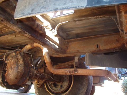 1993 Ford Bronco - The muffler & tailpipe cracked off while my brother-in-law still owned it, and he never fixed it, so it's held on by coathangers at the mom…