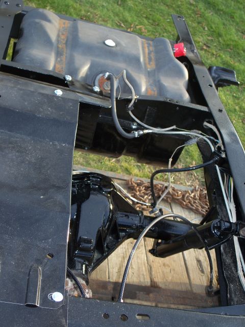 1979 Ford F-250 - Frame components including fuel tank and rear axle assembly are visible in this photo.