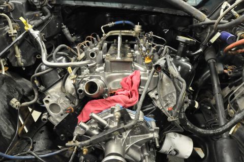 1996 Ford Bronco - Engine bay during rebuild, showing V8 engine components and wiring.