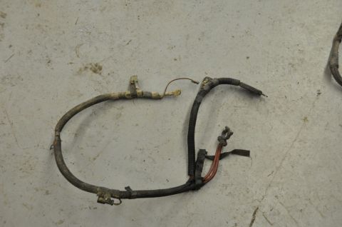 1996 Ford Bronco - This is a close-up of an automotive wiring harness, likely for a vehicle's engine bay.