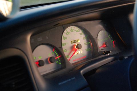 1985 Mercury Grand Marquis - Interior view of a car's dashboard gauges, including the speedometer and odometer.