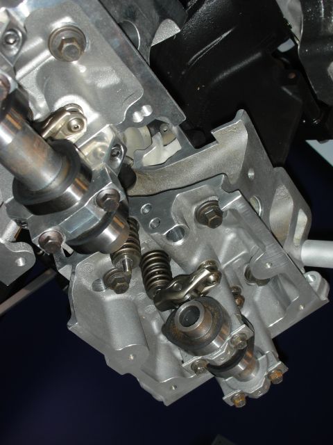 1998 Ford Crown Victoria - Detailed view of internal engine components, focusing on the valve train mechanism.
