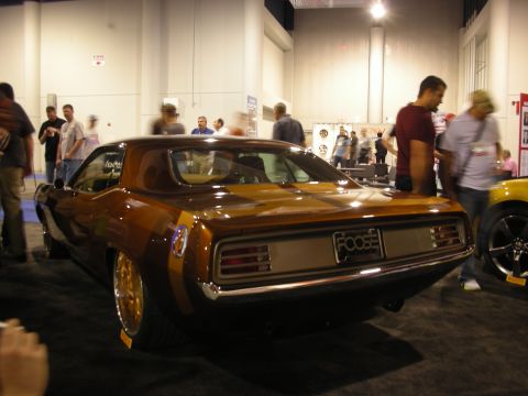 1998 Ford Crown Victoria - Rear view of a custom 1970 Plymouth Barracuda at a car show.
