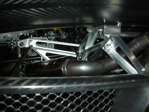 1998 Ford Crown Victoria - This image shows the complex suspension and exhaust system components visible from the undercarriage of a vehicle.