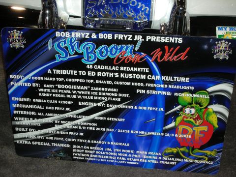 1998 Ford Crown Victoria - Display sign details the custom build of a 1948 Cadillac Sedanette, honoring Ed Roth's Kustom car culture.
