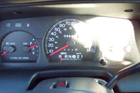 2001 Ford Crown Victoria - Interior view of a vehicle's dashboard gauges, including the odometer and speedometer.