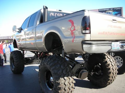 1998 Ford Crown Victoria - This heavily modified Ford F-Series truck features extreme lift and large off-road tires.