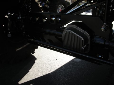 1998 Ford Crown Victoria - Aftermarket differential cover with fins is visible on the rear axle of a modified vehicle.