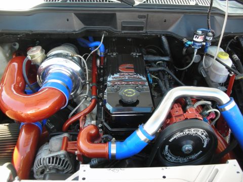 1998 Ford Crown Victoria - Customized Cummins Turbo Diesel engine a large turbo and modified intake plumbing.