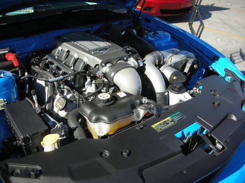 1998 Ford Crown Victoria - Close-up of a supercharged V8 engine, likely from a performance car.