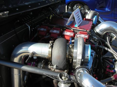 1998 Ford Crown Victoria - Custom engine bay features twin turbochargers and performance ignition coils.