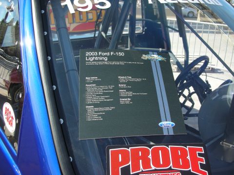 1998 Ford Crown Victoria - A document provides specifications for a 2003 Ford F-150 Lightning, including details on its powertrain and chassis.