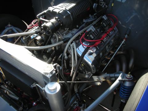 1998 Ford Crown Victoria - Custom supercharged V8 engine with polished components and performance exhaust headers.