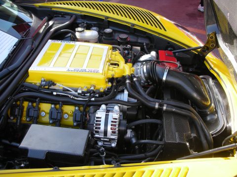 1998 Ford Crown Victoria - A close-up view of a yellow engine bay, a large yellow supercharger with 'LPE' branding.