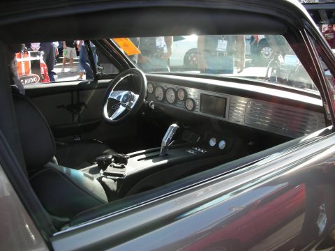 1998 Ford Crown Victoria - Customized car interior with a modern dashboard and classic racing elements.