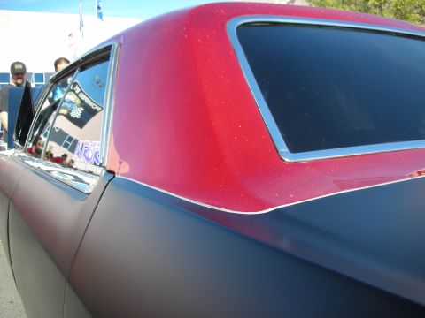 1998 Ford Crown Victoria - Custom two-tone paint job on a car, a matte black finish and a glitter red roof.