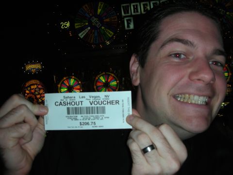 1998 Ford Crown Victoria - A man smiles while holding a cashout voucher from Sahara Las Vegas.