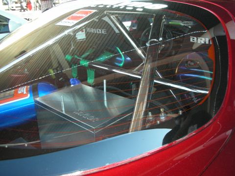 1998 Ford Crown Victoria - Custom roll cage and fuel cell are visible through the rear window of this modified vehicle.