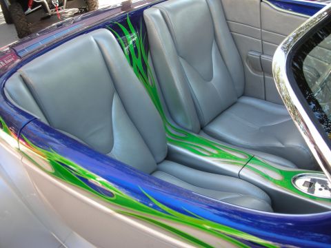 1998 Ford Crown Victoria - Interior view of a custom hot rod grey seats and vibrant green flame graphics.