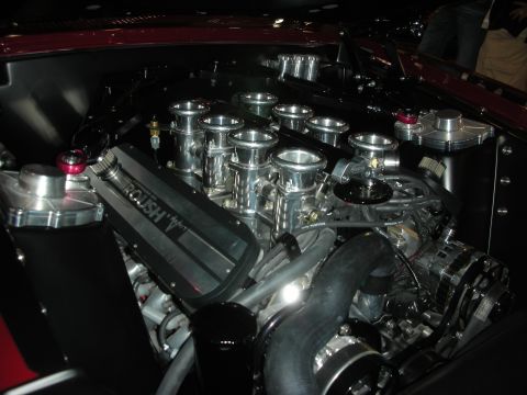 1998 Ford Crown Victoria - Close-up view of a modified engine bay, highlighting custom performance parts.