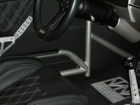 1998 Ford Crown Victoria - Custom car interior features a roll cage, racing seats, and a modified steering wheel.