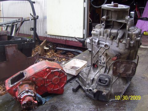 1978 Ford Bronco - Two vehicle transmissions are displayed on a workbench, with a date stamp of 10/30/2009.
