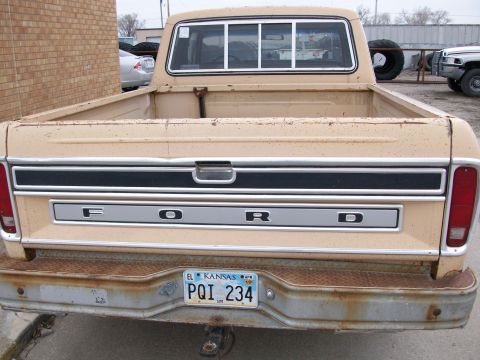1977 Ford F-150 - Rear view of a tan 1977 Ford F-150 pickup truck with a Kansas license plate.