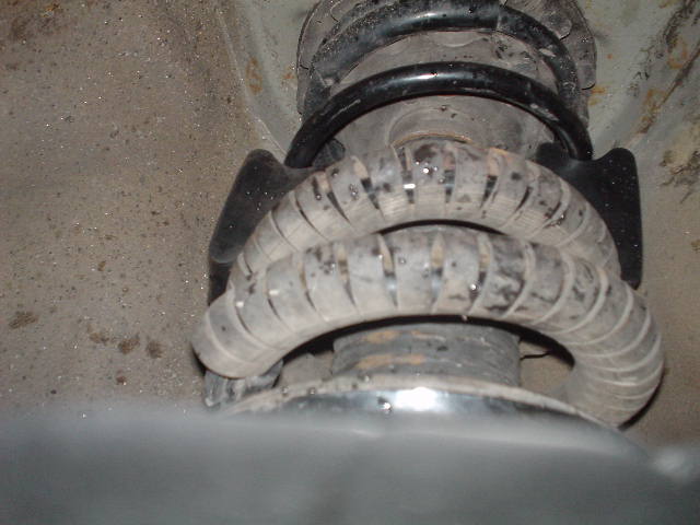 This is a picture of the coil spacers i used to raise the sagging back end of my car. It raised it about 3/4" - 1". It also helped firm up the back end....probbaly the best $8.00 ive spent on the car.