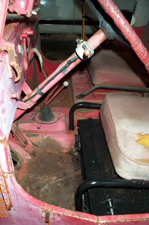 1954 Jeep Wrangler - Interior view of a 1954 Jeep Wrangler, highlighting the floor pan, seats, and dashboard components.