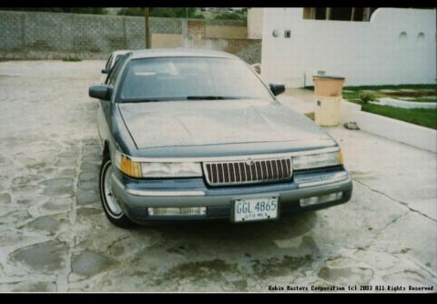 1992 Mercury Grand Marquis - Front view of a 1992 Mercury Grand Marquis with a license plate reading GGL 4865.
