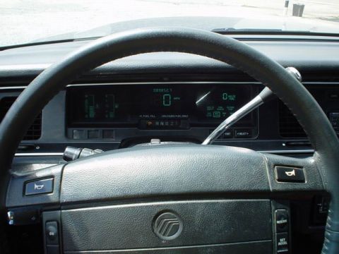 1992 Mercury Grand Marquis - The digital dashboard of a 1992 Mercury Grand Marquis displays the odometer and speed.
