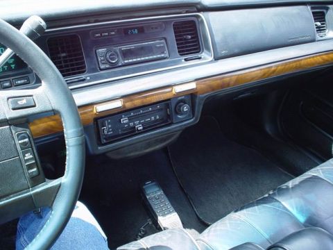 1992 Mercury Grand Marquis - Interior view of a 1992 Mercury Grand Marquis, highlighting the dashboard and audio system.